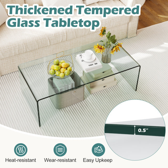 Clear tempered glass coffee table with rounded edges, 42 x 19.7 inches, ideal for living room elegance and easy upkeep.