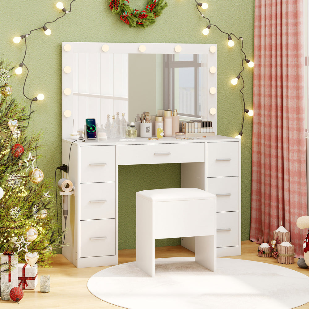 White 43.5-inch vanity desk with LED mirror and lights, featuring 7 drawers and a storage stool for bedroom use.