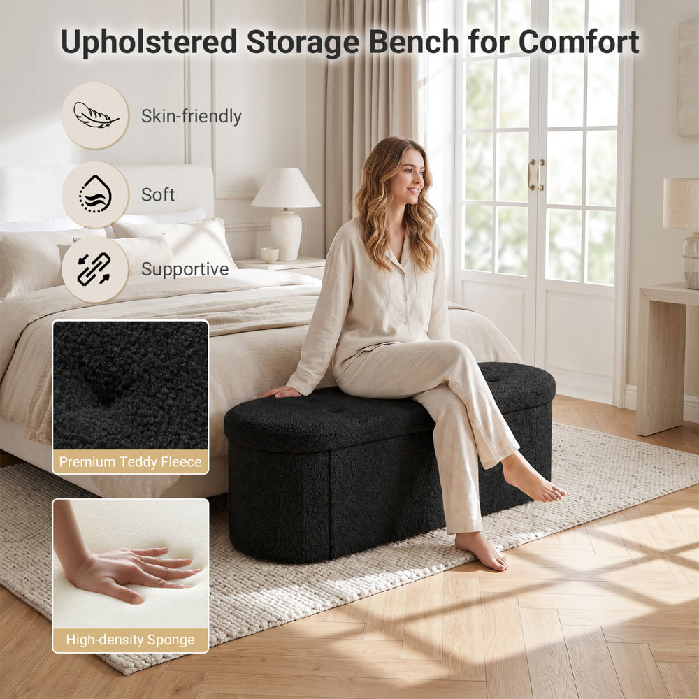 Folding 43" black teddy storage ottoman bench with dividers, featuring soft fleece upholstery and spacious compartments for organization.