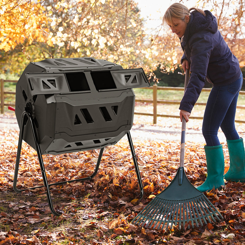 Composting tumbler bin with dual rotating chamber, 43-gallon capacity, ideal for efficient garden composting.
