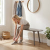 Gray 43-inch solid wood farmhouse dining bench with rubber wood legs, ideal for entryways and compact spaces.