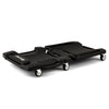 Foldable mechanic creeper with padded headrest and tool trays, supports 350 lbs, features low-noise casters for easy.