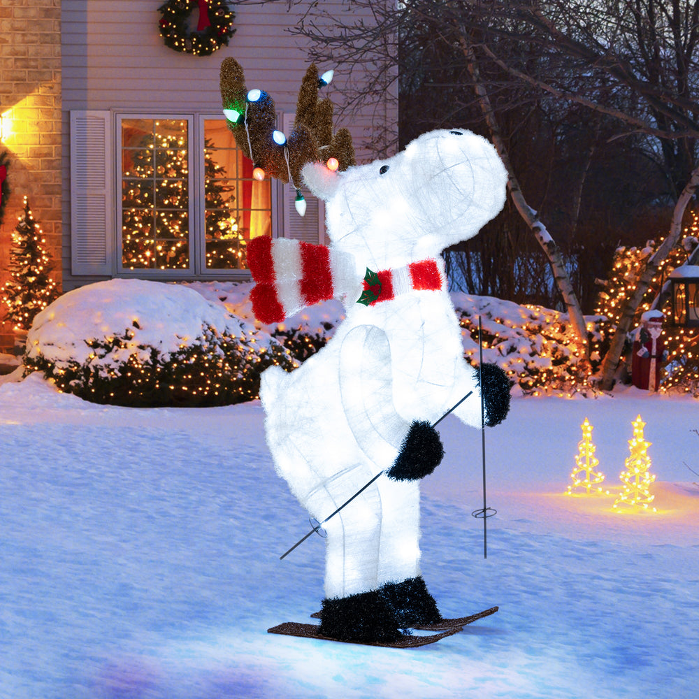 44" animated Christmas reindeer decoration with skiing pose, pre-lit with 98 cool white LEDs, perfect for outdoor.