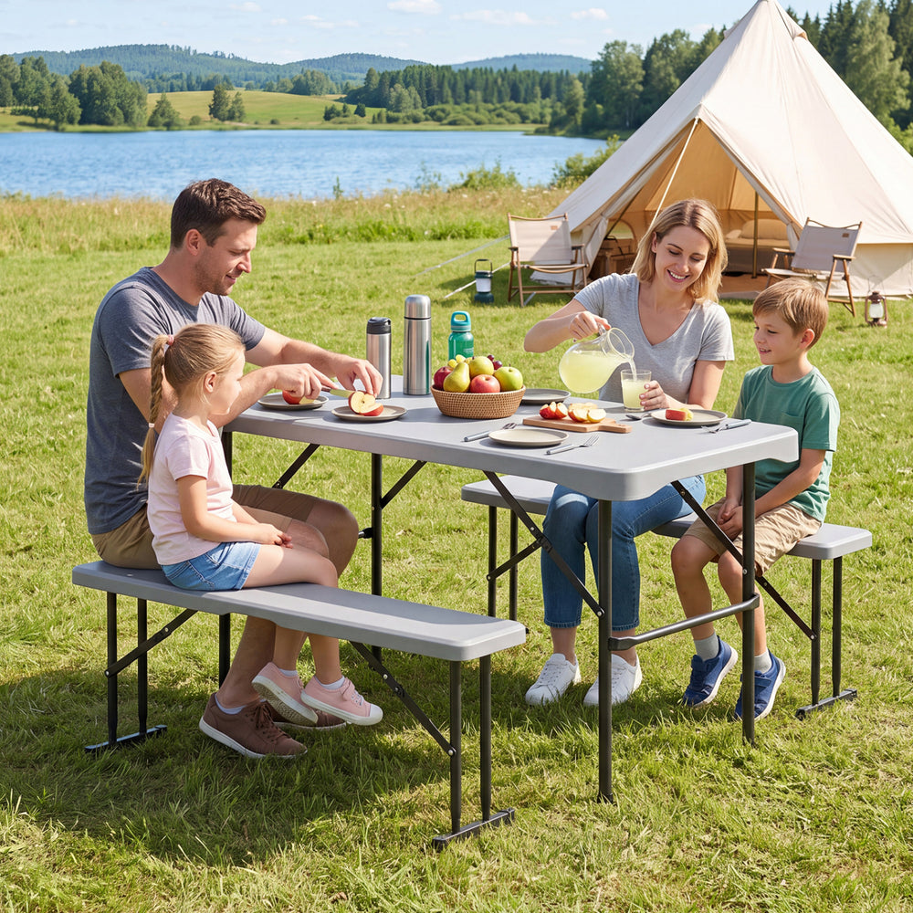 Folding picnic table set with gray HDPE top and two benches, perfect for outdoor dining and gatherings.