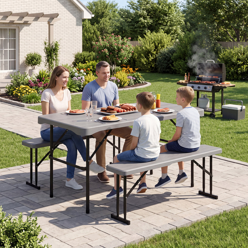 44" HDPE folding picnic table set with two benches, featuring a gray stain-resistant surface for outdoor gatherings.