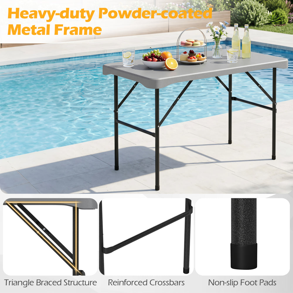44" HDPE folding picnic table set with gray top, sturdy metal frame, and non-slip foot pads for outdoor gatherings.