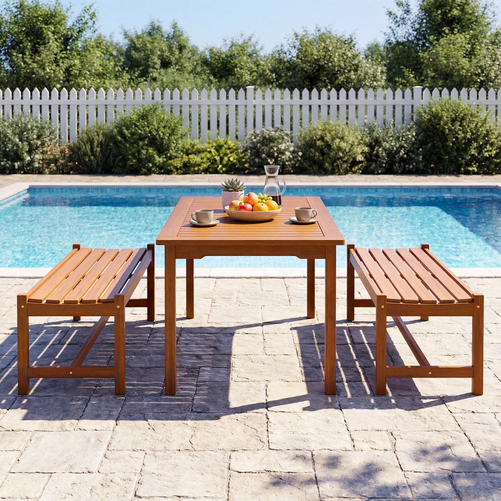 Solid hardwood 44" patio bench with teak oil finish, slatted design for airflow, perfect for outdoor dining.