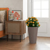 Tall brown flower pot with spiral texture, featuring drainage holes and handles, ideal for indoor or outdoor plant.