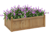 Rectangular brown planter box made of natural fir wood, featuring drainage holes and filled with vibrant purple flowers.