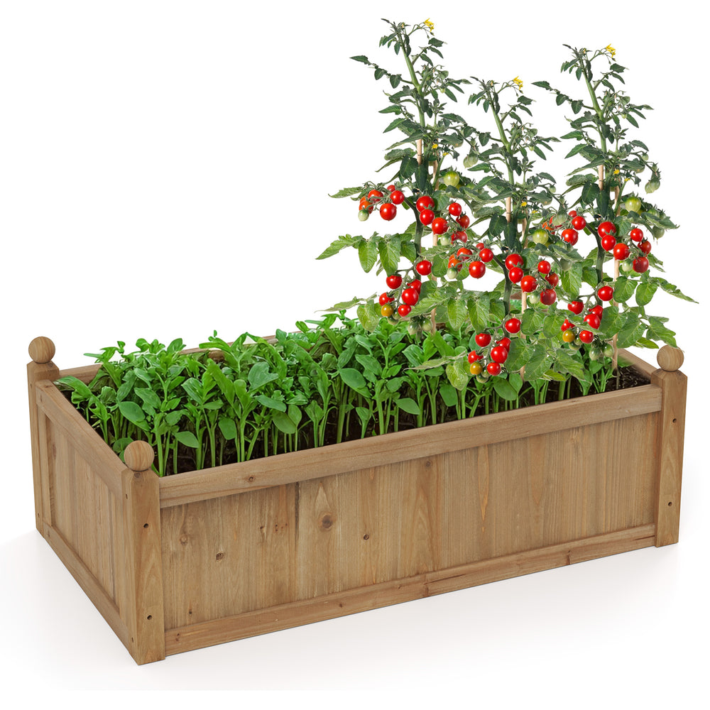 Rectangular brown planter box made of natural fir wood, featuring drainage holes, filled with tomatoes and leafy greens.