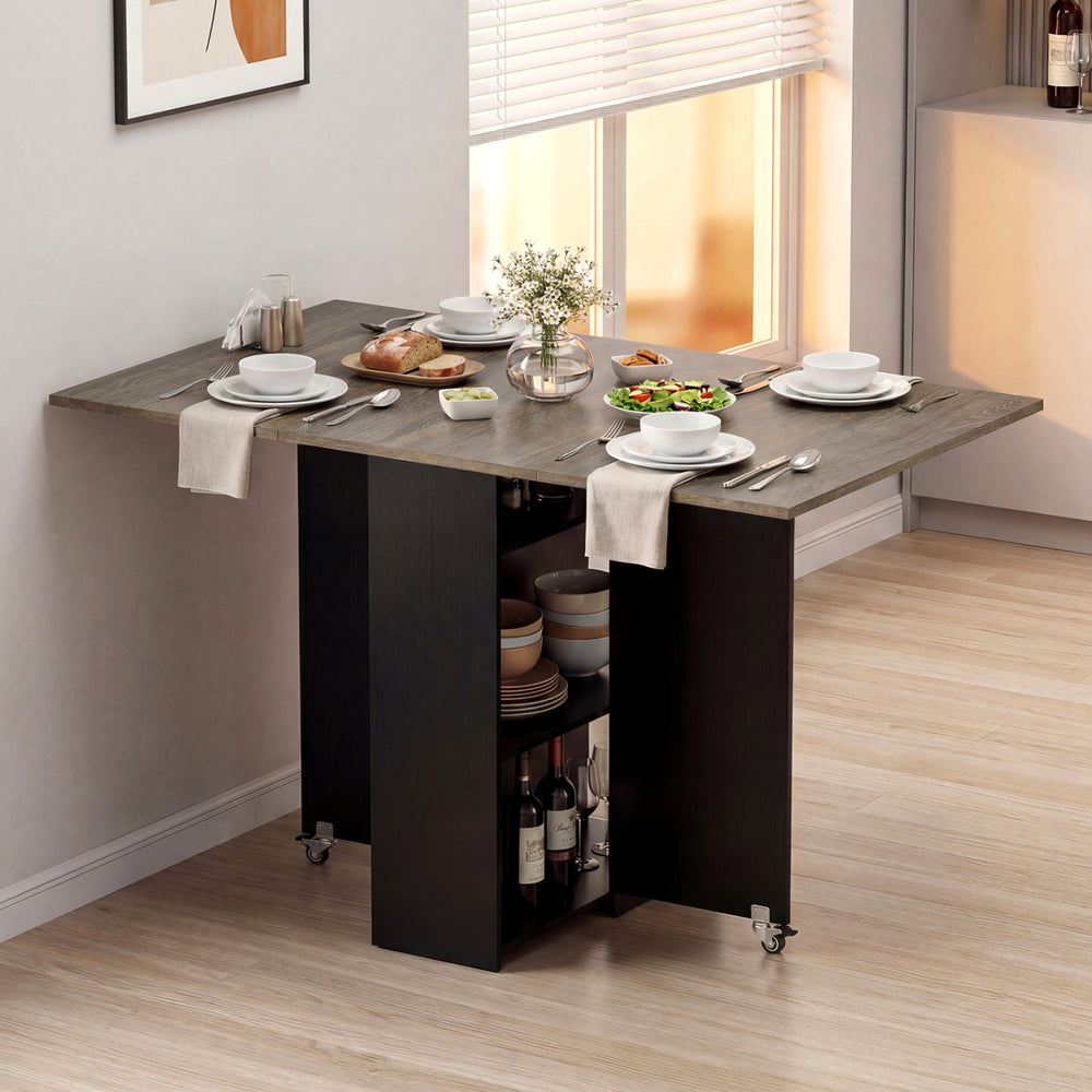 Extendable 47.5-inch wooden dinner table with drop leaves, lockable wheels, and organized storage for versatile use.