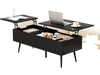 Lift top coffee table in black with two hidden compartments, ideal for storage and convenient use in living spaces.