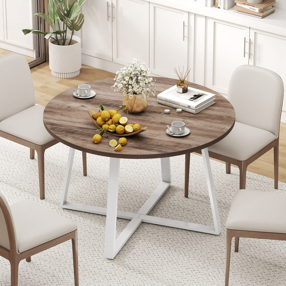 Round 47-inch dining table with a rustic wood-grain surface and stable X-shaped base, ideal for various settings.