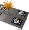 Dark gray 47-inch dining table set for four, featuring a smooth surface and stylish decor, ideal for small spaces.