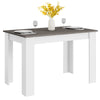 Dining table with a dark gray top and white legs, perfect for small spaces, accommodating up to 4 people.