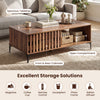 Mid-century walnut coffee table with spacious tabletop, open compartment, and stylish fence door for versatile storage.