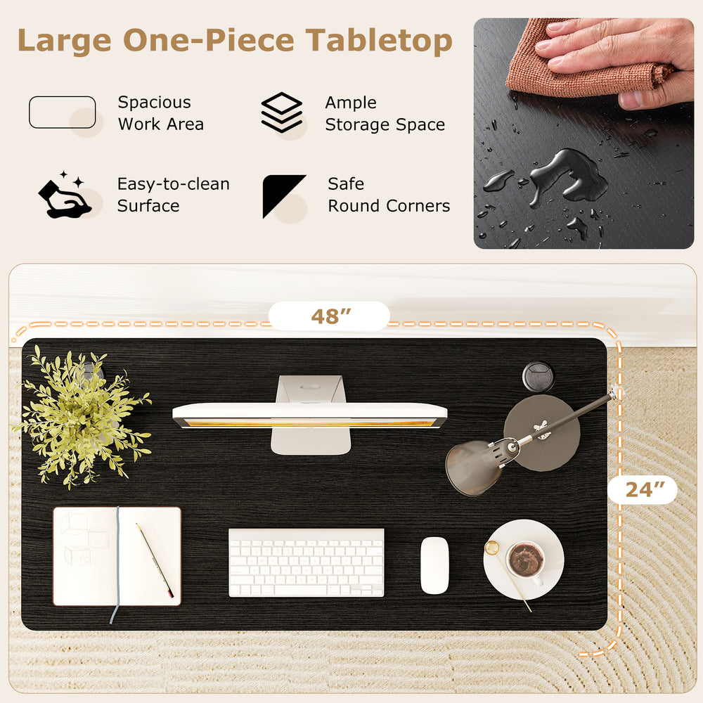 Large black 47” x 24” universal tabletop with smooth surface and dual cable holes for efficient workspace organization.