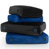 Stack of sensory crash pads in blue and black, featuring soft foam blocks and washable covers for safe play and comfort.