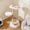 Solid wood cat tree with a hanging cradle, plush platforms, and jute scratching post for cozy lounging and scratching.