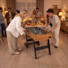 Folding 48-inch soccer table with realistic graphics, sturdy legs, and anti-slip handles, perfect for home gatherings.