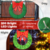 Extra large 48-inch pre-lit Christmas mesh wreath with a vibrant red bow, showcasing 200 LED lights for festive.