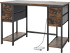 48-inch computer desk with a brown wood finish, featuring 4 fabric drawers and a built-in power outlet for convenience.