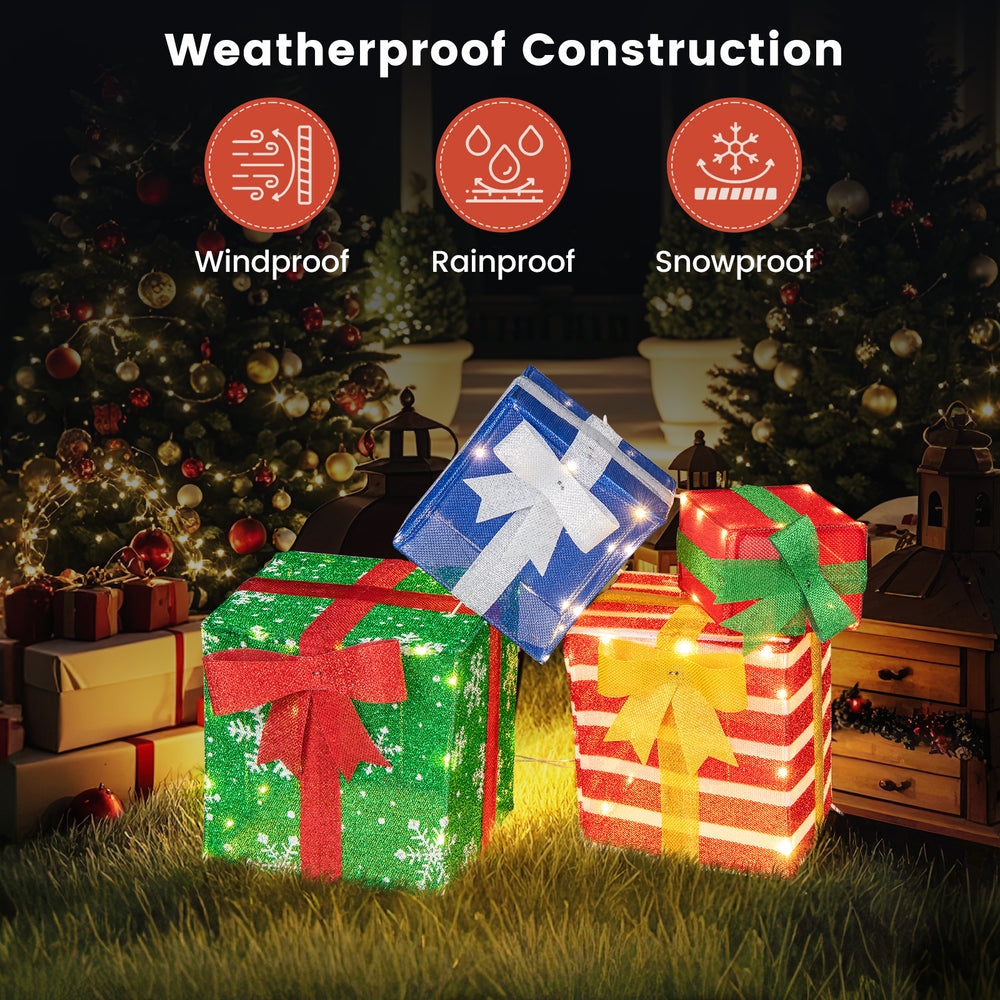 Lighted stacked gift boxes with LED lights, weatherproof construction, and decorative bows for festive indoor or.