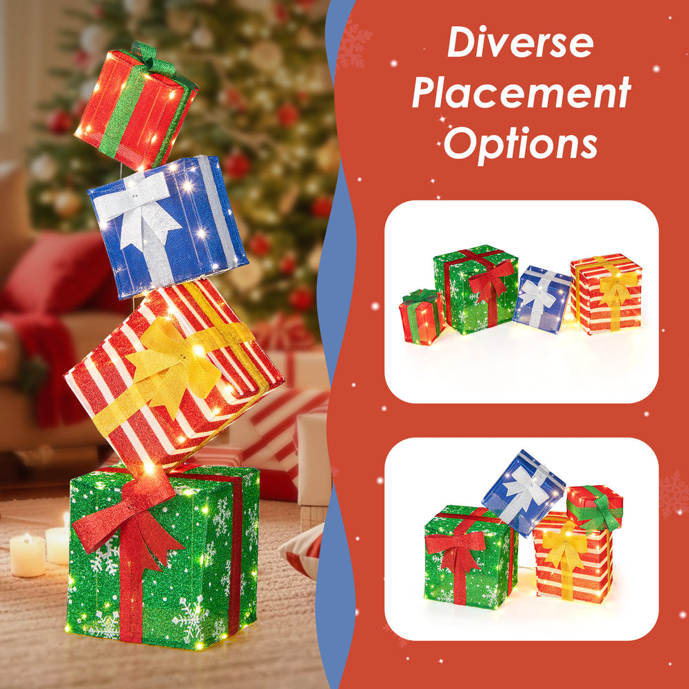 Lighted stacked gift boxes with LED lights and decorative bows, perfect for festive indoor or outdoor Christmas decor.