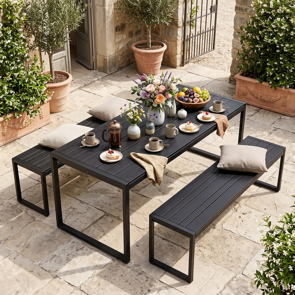 Black 48" outdoor bench with wood-plastic composite and metal frame, perfect for garden seating and outdoor gatherings.