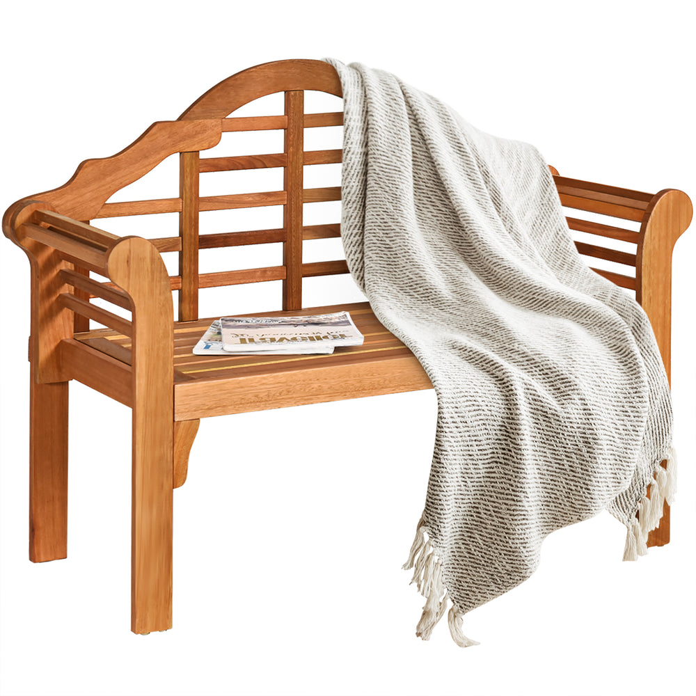 Eucalyptus wood outdoor folding bench with backrest and armrest, featuring a cozy blanket, ideal for patio or garden.