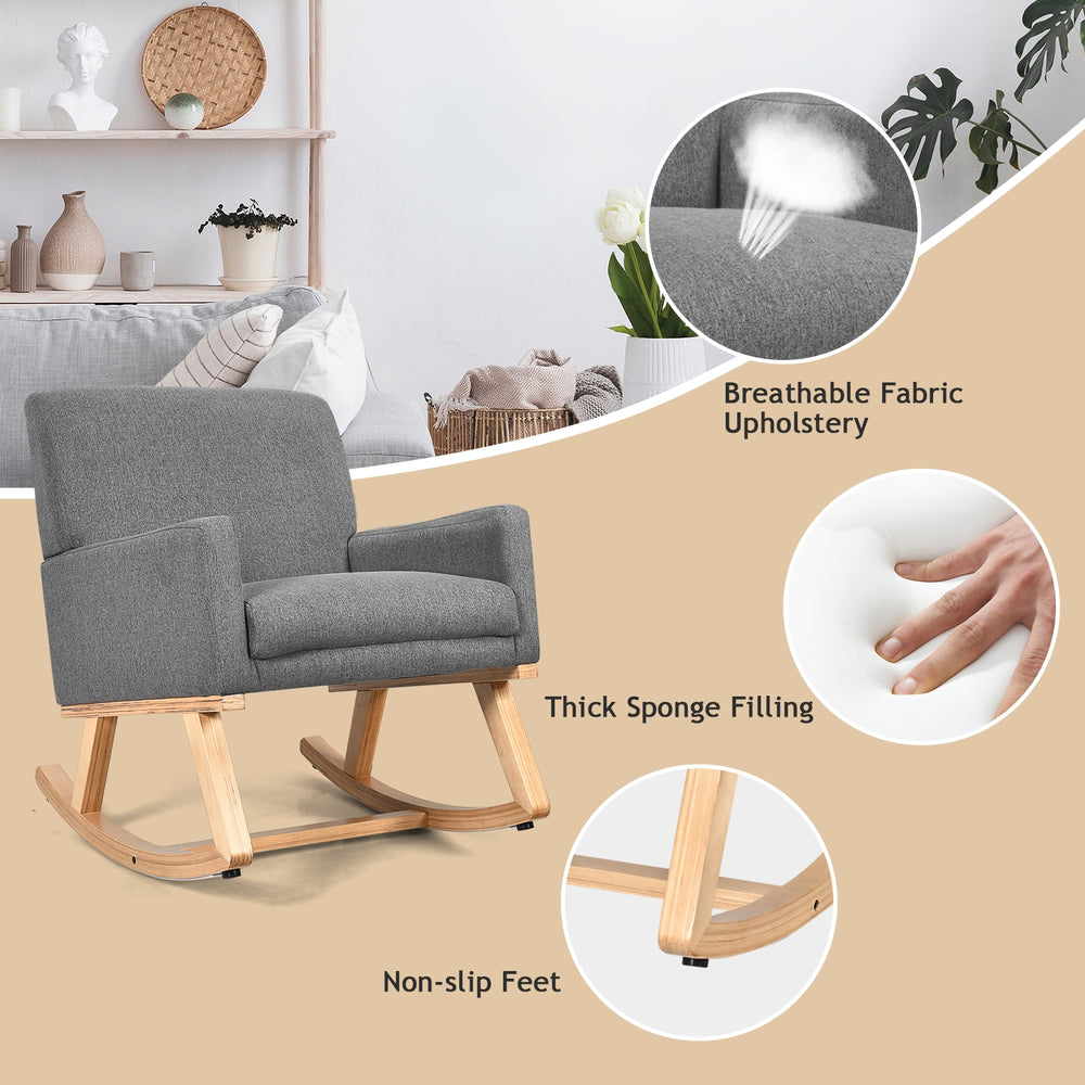 Upholstered rocking chair with gray fabric, solid wood base, and ergonomic design for comfort in living room or bedroom.