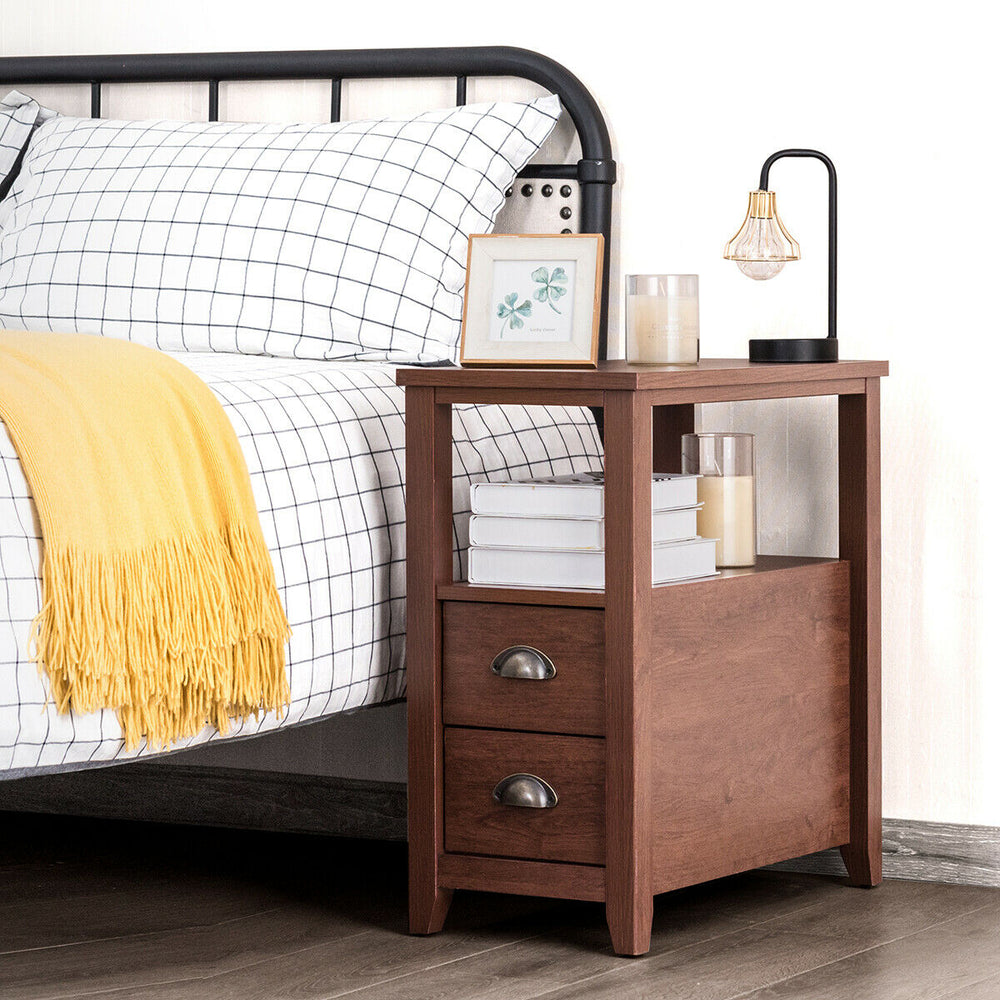 Compact brown wooden end table with 2 drawers and shelf, featuring retro metal handles, ideal for bedroom or living.