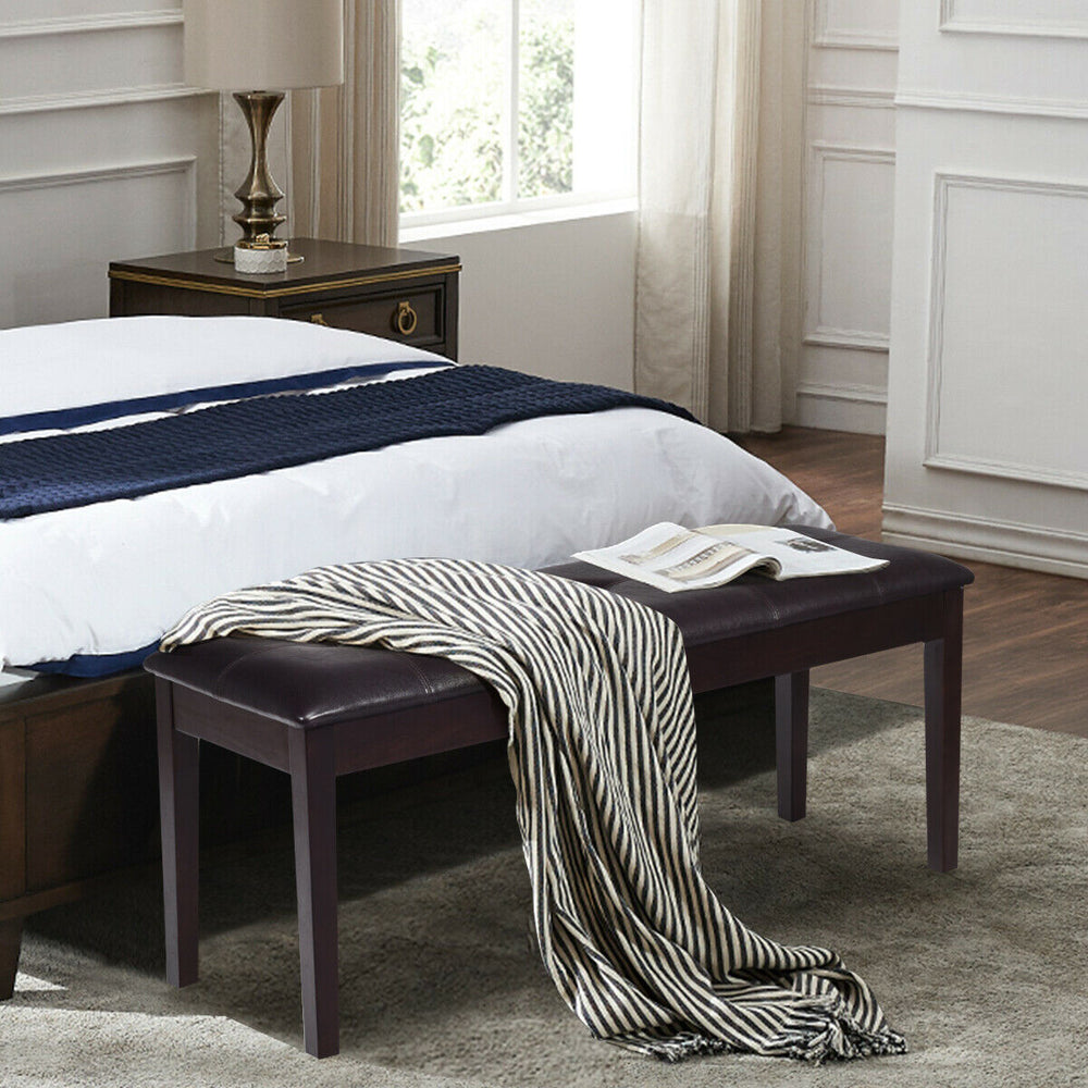 Upholstered brown dining room bench with solid wood legs, cushioned seat, ideal for bedrooms and dining areas.