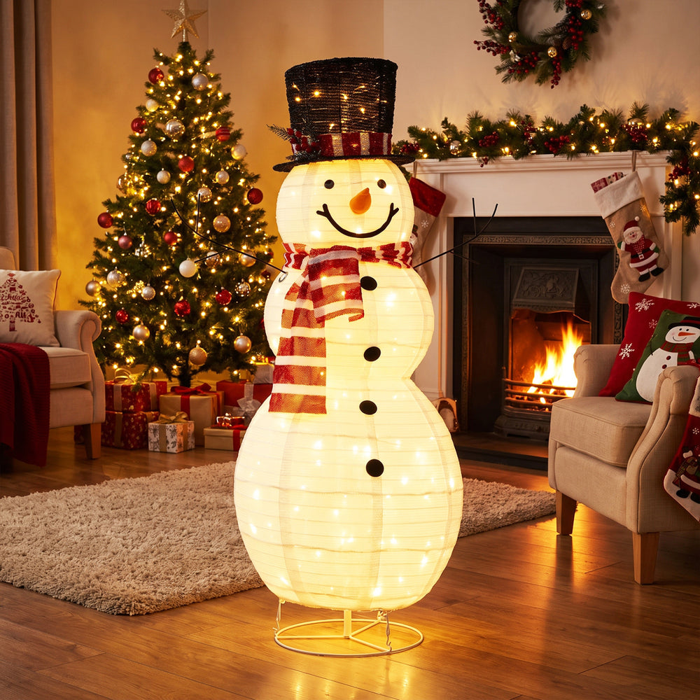 Lighted 4.2 ft Christmas snowman decoration with 120 LED lights, perfect for indoor and outdoor holiday displays.