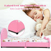 Twin size upholstered toddler bed in pink with raised feet, designed for safety and comfort for kids' restful sleep.