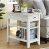 White 3-tier nightstand with drawer and open shelves, perfect for bedside or living room storage and decor.