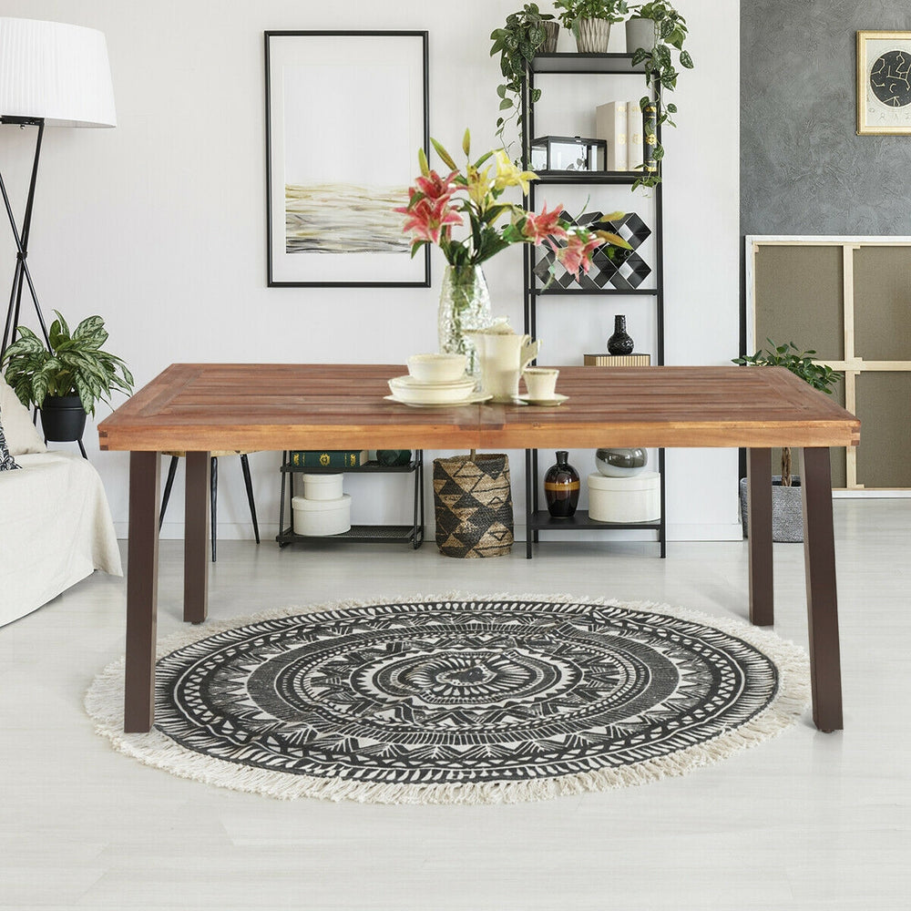 Rectangular acacia wood dining table with steel legs, featuring a waterproof surface, ideal for living room or patio.
