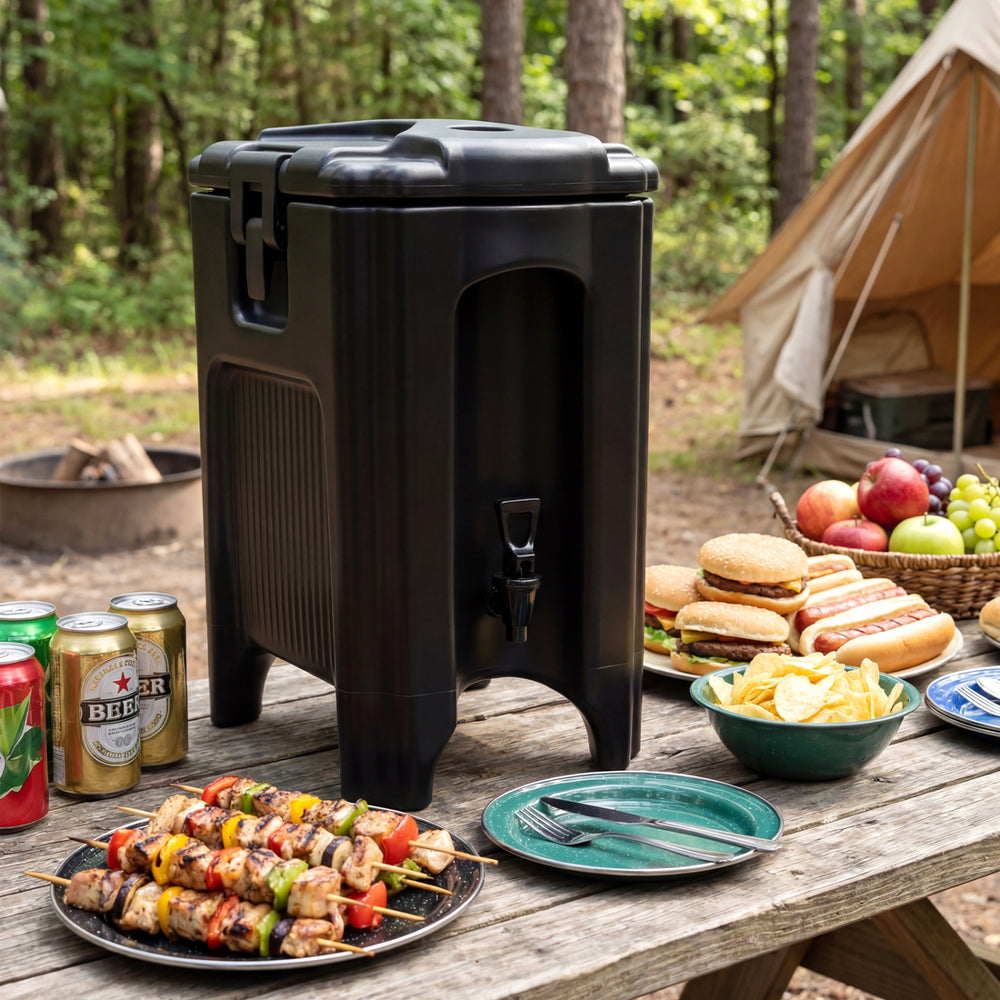 Black insulated beverage dispenser with ergonomic handles, perfect for camping and outdoor parties, showcasing food and.