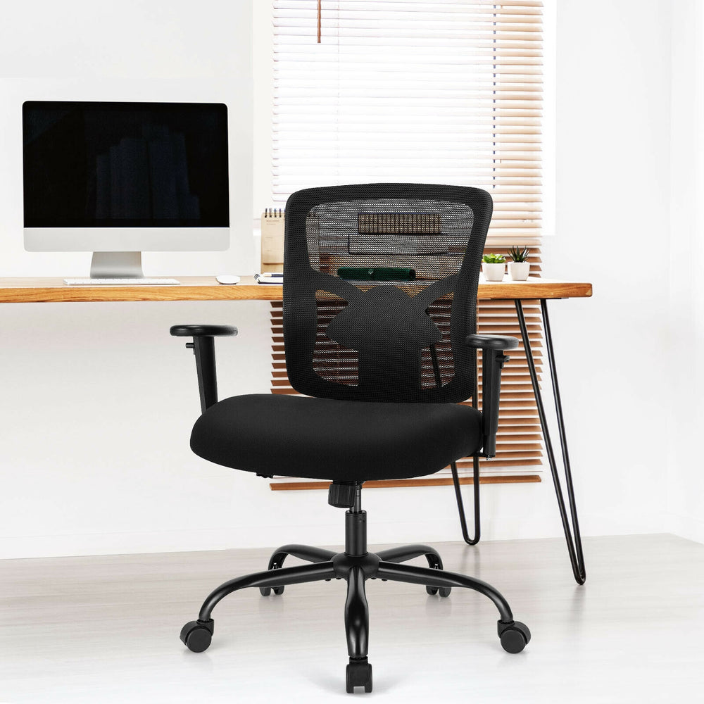 Black mesh big and tall office chair with adjustable lumbar support and armrests, ideal for ergonomic comfort in any.