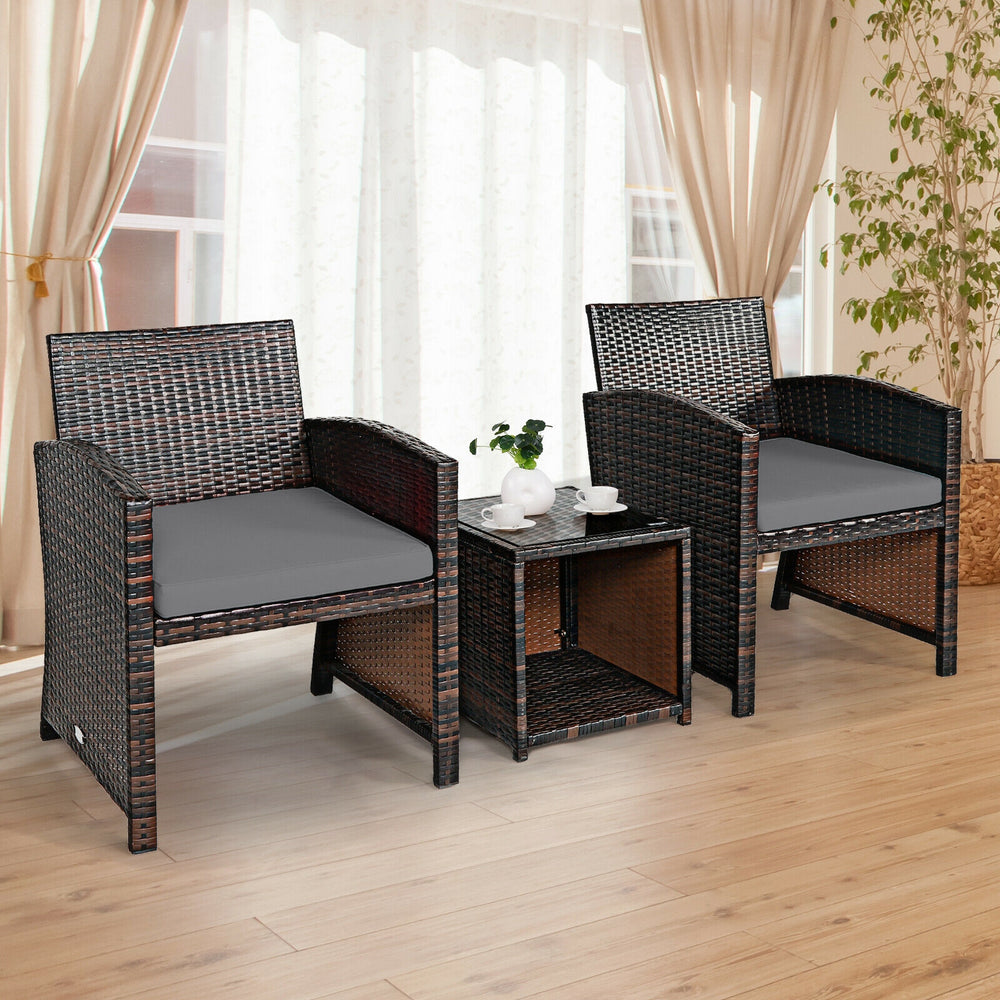 Set of two PE rattan chairs featuring wide armrests and gray cushions, ideal for comfort in garden or patio settings.