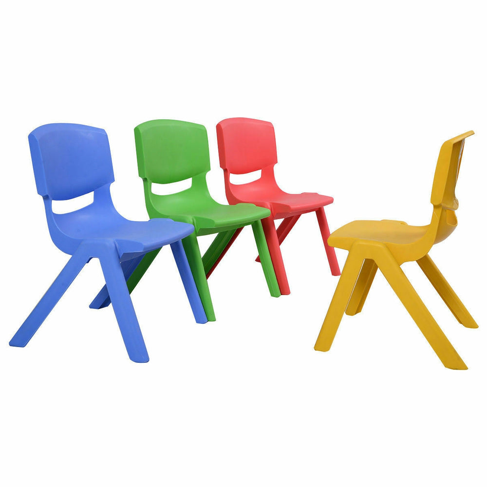 Colorful stackable plastic children chairs in blue, green, red, and yellow, perfect for playrooms and daycare settings.