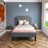 Twin upholstered platform bed with button-tufted headboard, soft fabric, and under-bed storage for a tidy room.