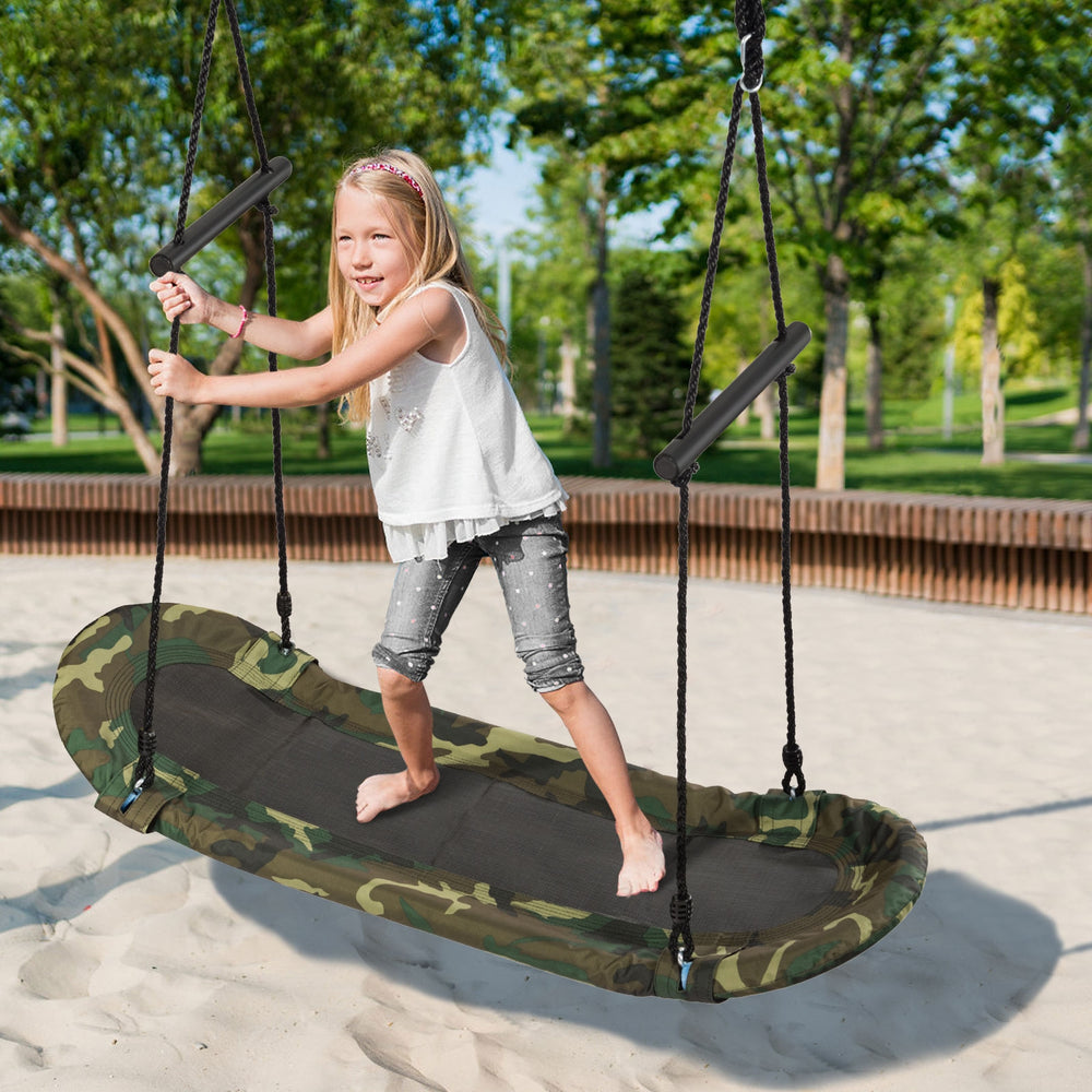 Kids enjoy the Saucer Tree Swing Surf, a durable outdoor swing with adjustable height and foam handles for safety.