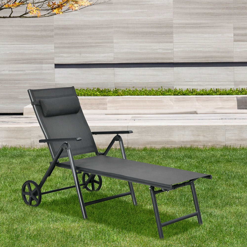 Gray aluminum patio lounge chair with wheels, foldable design, and high backrest with neck pillow for easy outdoor.