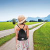 Drawstring backpack in black with zipper pockets, ideal for gym, yoga, and travel, shown against a scenic outdoor.
