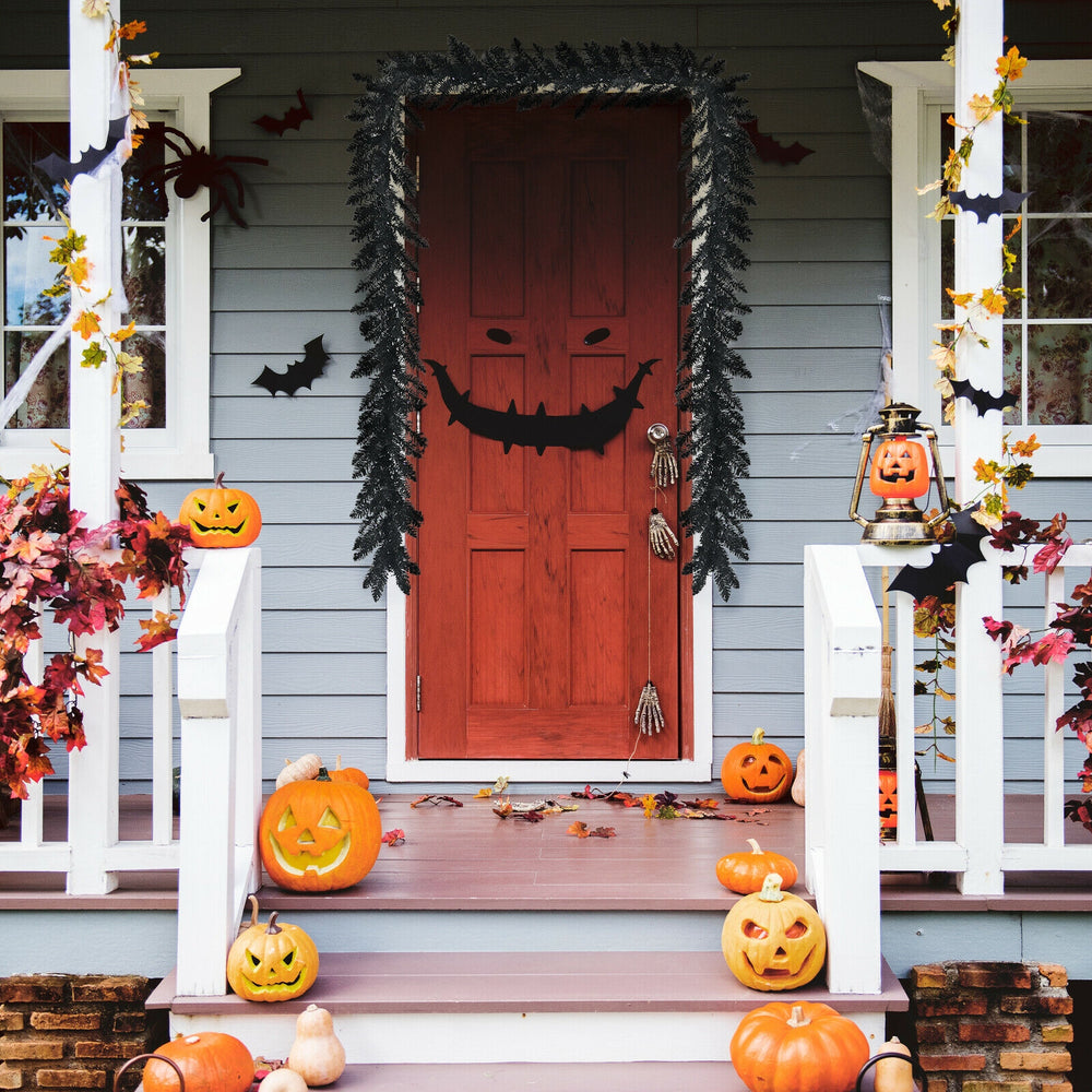 Black pre-lit Halloween garland with 50 purple LED lights, perfect for festive outdoor decoration and creating a spooky.