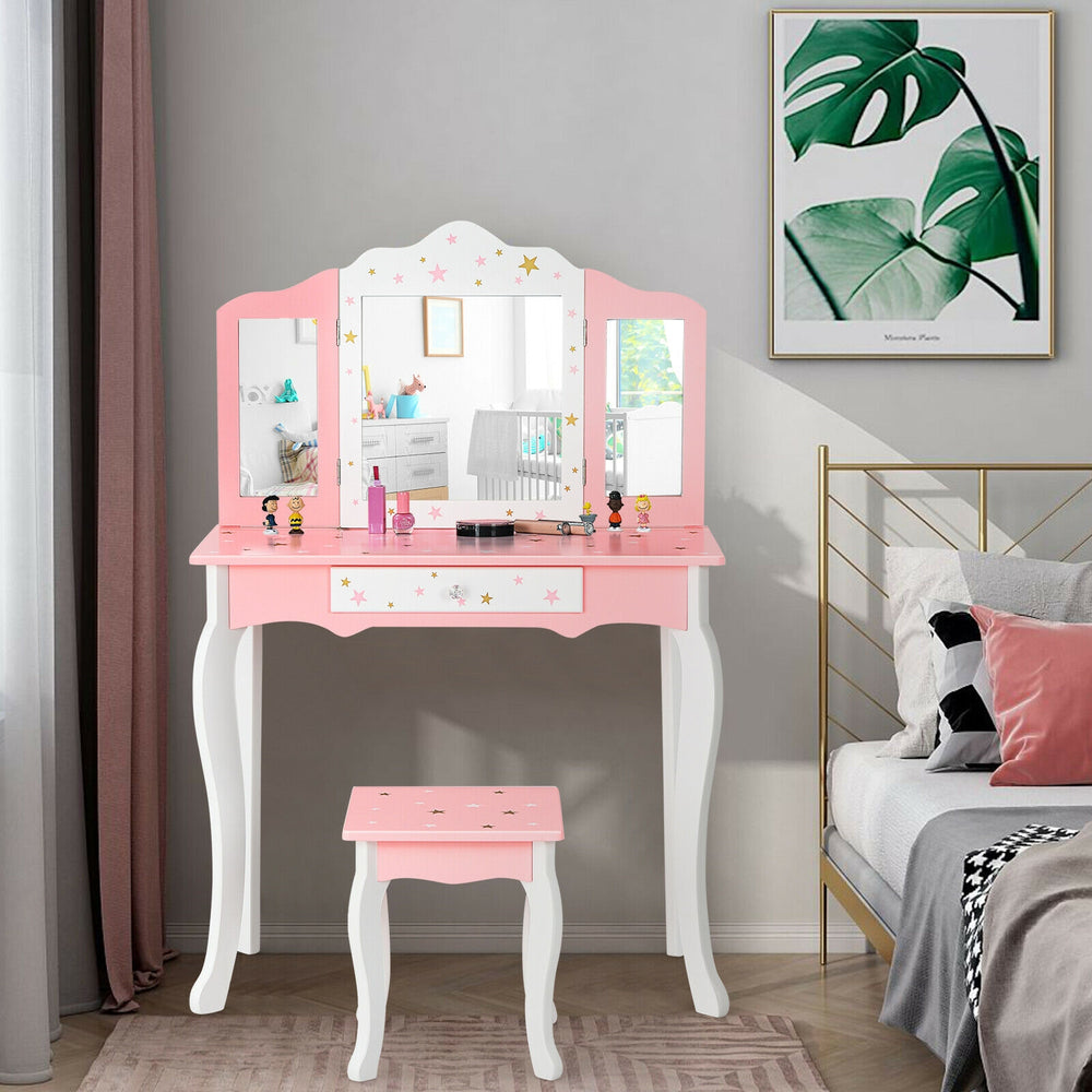 Kids pink vanity table and stool set with tri-folding mirror, drawer, and star patterns for fun and practical use.