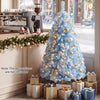 Ice blue 4.5 FT pre-lit Christmas tree with warm white lights, ideal for festive holiday displays and easy setup.