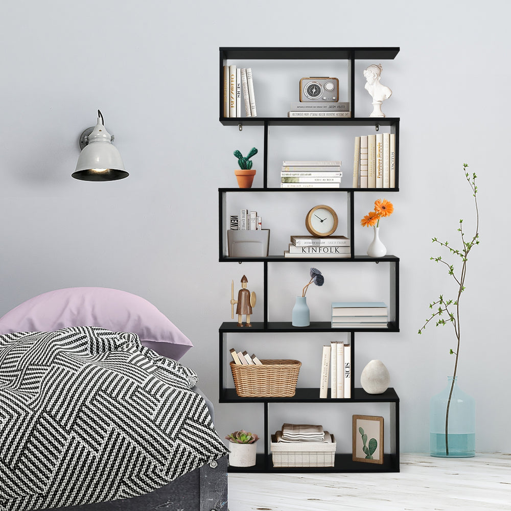 S-shaped black 6-tier bookshelf with spacious compartments, perfect for displaying books and decor in any room.