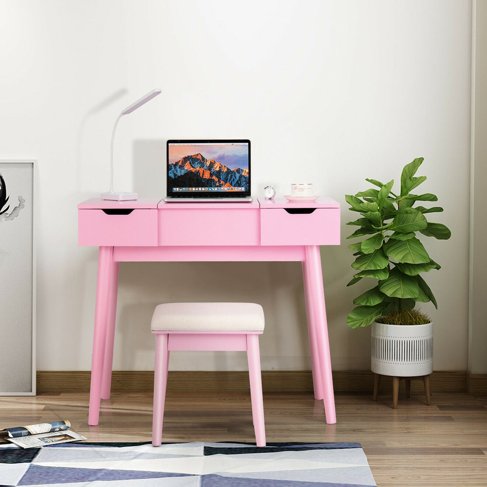 Pink makeup vanity table with flip-top mirror, 2 drawers, and plush stool, perfect for creating a chic and functional.
